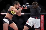 Zhang hooked Aguilar's arm and that was about all that was needed to get her to tap out